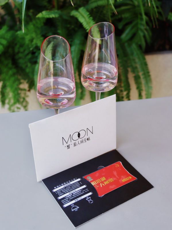   Delivering 350 Custom Flamingo Champagne Glass & Crab Voucher Sets for a Gala Dinner in Singapore