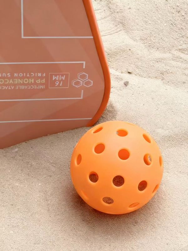  How a Singapore Fitness Brand Used Orange Pickleball Paddles as Staff Gifts