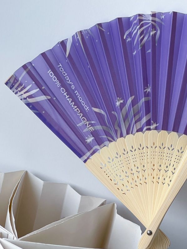  How a Singapore Design Firm Used Handcrafted Wooden Fans as Client Gifts & Event Souvenirs