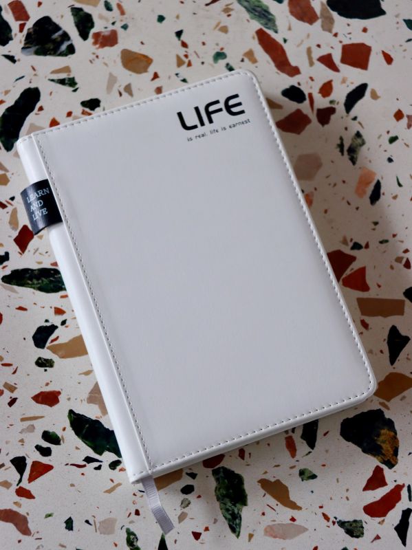 How a Philippine Company Impressed Guests with Custom White Notebooks as Annual Dinner Souvenirs